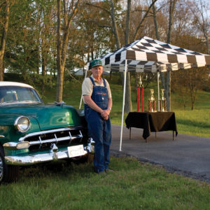 ShelterLogic - 10x10 SL Pop-up Canopy, Checkered Flag Cover, Black Roller Bag