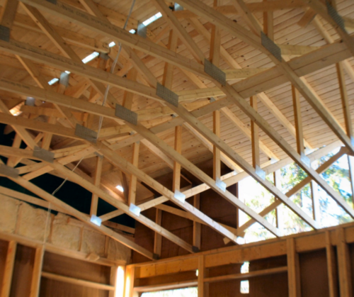 Wood building roofing