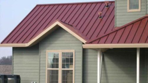 Green House With Red Roof