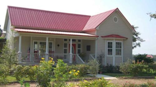 Red Metal Roof with Beige House