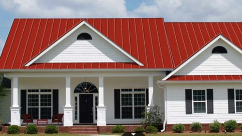 White House With Red Metal Roof