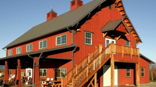 Orange House With Red Metal Roof