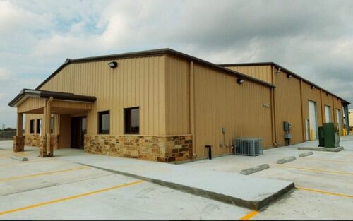 Industrial building with stone accent walls.