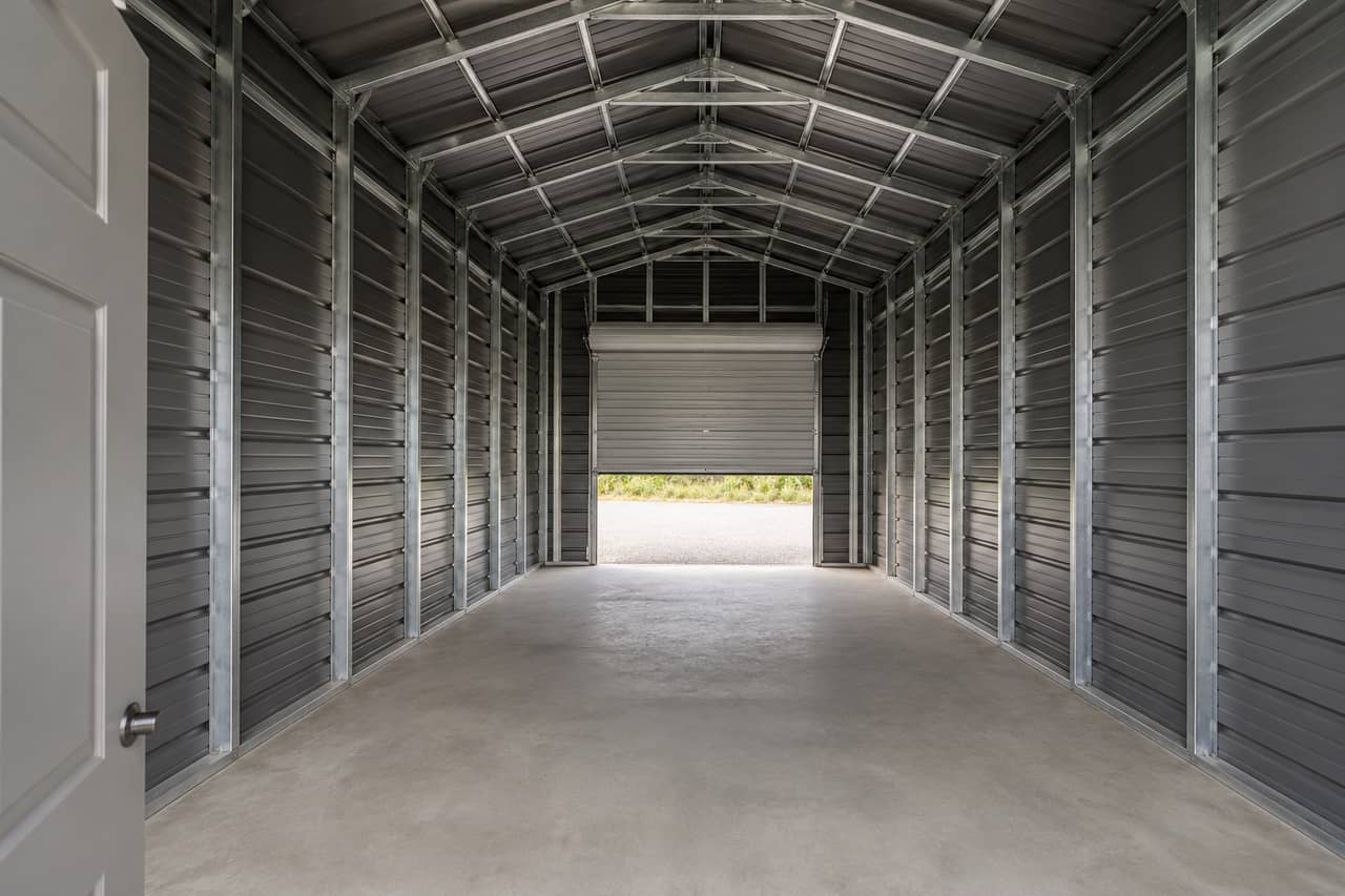 Expansion-ready 14x24 small business shop interior framed for partitions and electrical