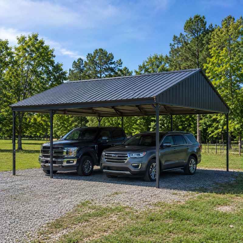 24x36 metal carport - two-vehicle open carport with charcoal vertical-rib roof on rural lot