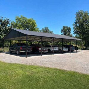 40x70 metal carport - long open-sided carport for multiple vehicles with charcoal vertical-rib roof on rural lot