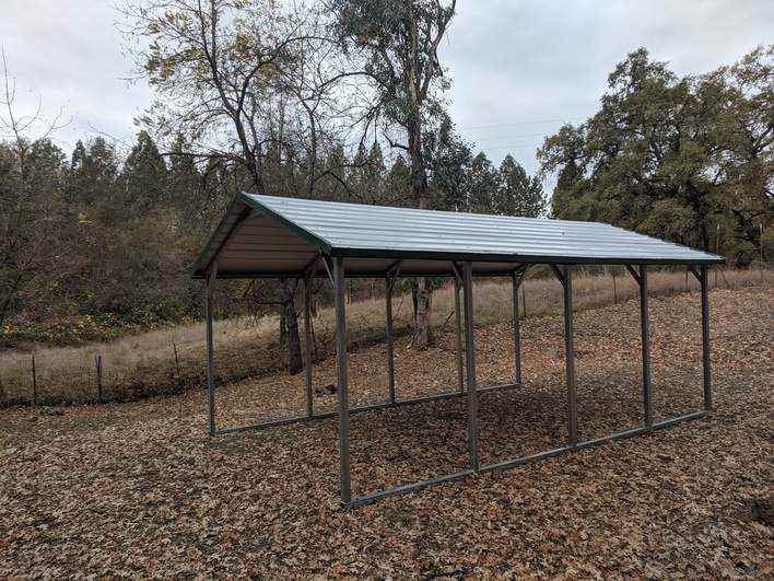 Real Steel and Stud install: 12×21×7 metal building, California with engineered roof and side panels