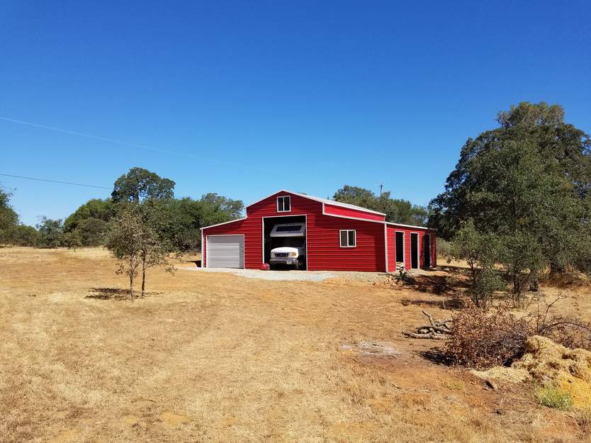 Steel and Stud customer photo — 18×31×12 metal barn, engineered roof and side panels