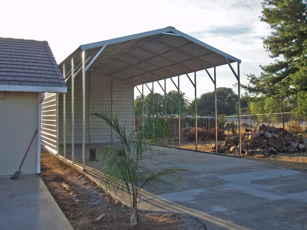 Real Steel and Stud install: metal building with engineered roof and side panels