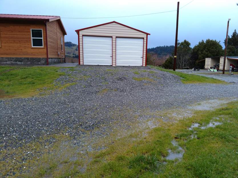 Steel and Stud customer install — 24×25×11 steel garage, engineered roof and side panels
