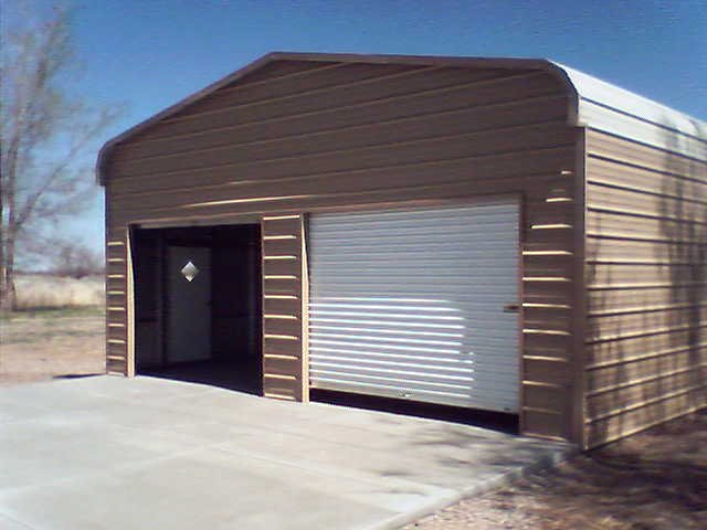 Custom 24×31×9 metal building from Steel and Stud, engineered with standard rounded-edge roof
