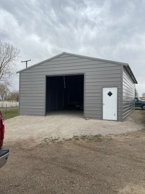 Custom 26×40×11 metal building from Steel and Stud, Colorado, engineered with engineered roof and side panels