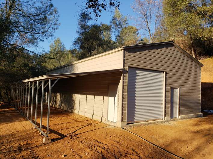 26×51×12 metal lean-to shelter built and erected by Steel and Stud crews