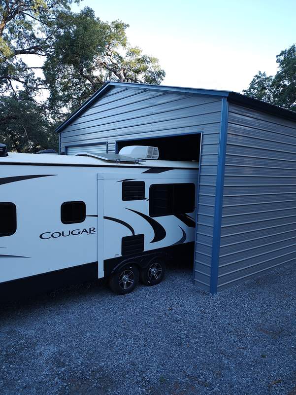 Custom 30×51×14 steel garage from Steel and Stud, engineered with A-frame roof with vertical panels