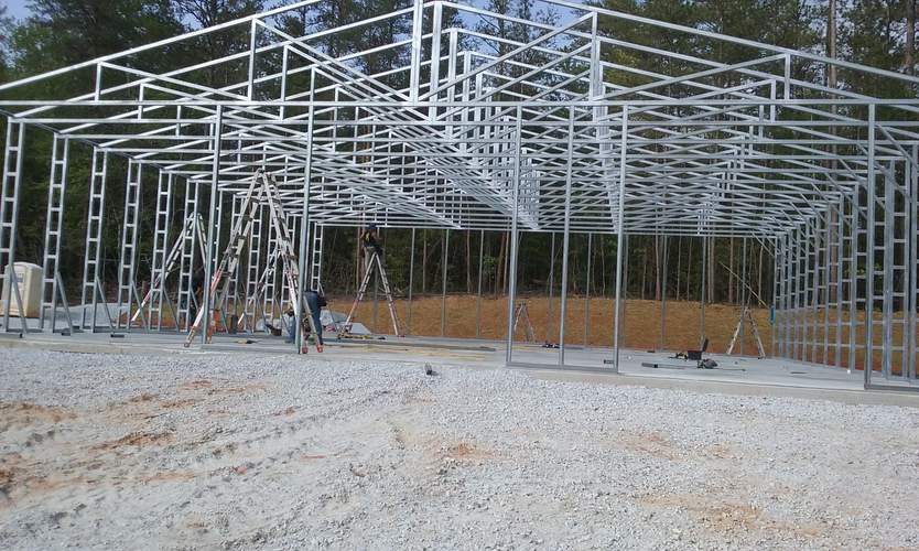 Steel and Stud customer photo — 50×52 steel building frame, engineered roof and side panels