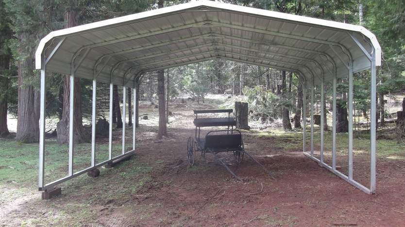 Steel and Stud customer install — 18×21×7 metal building, standard rounded-edge roof