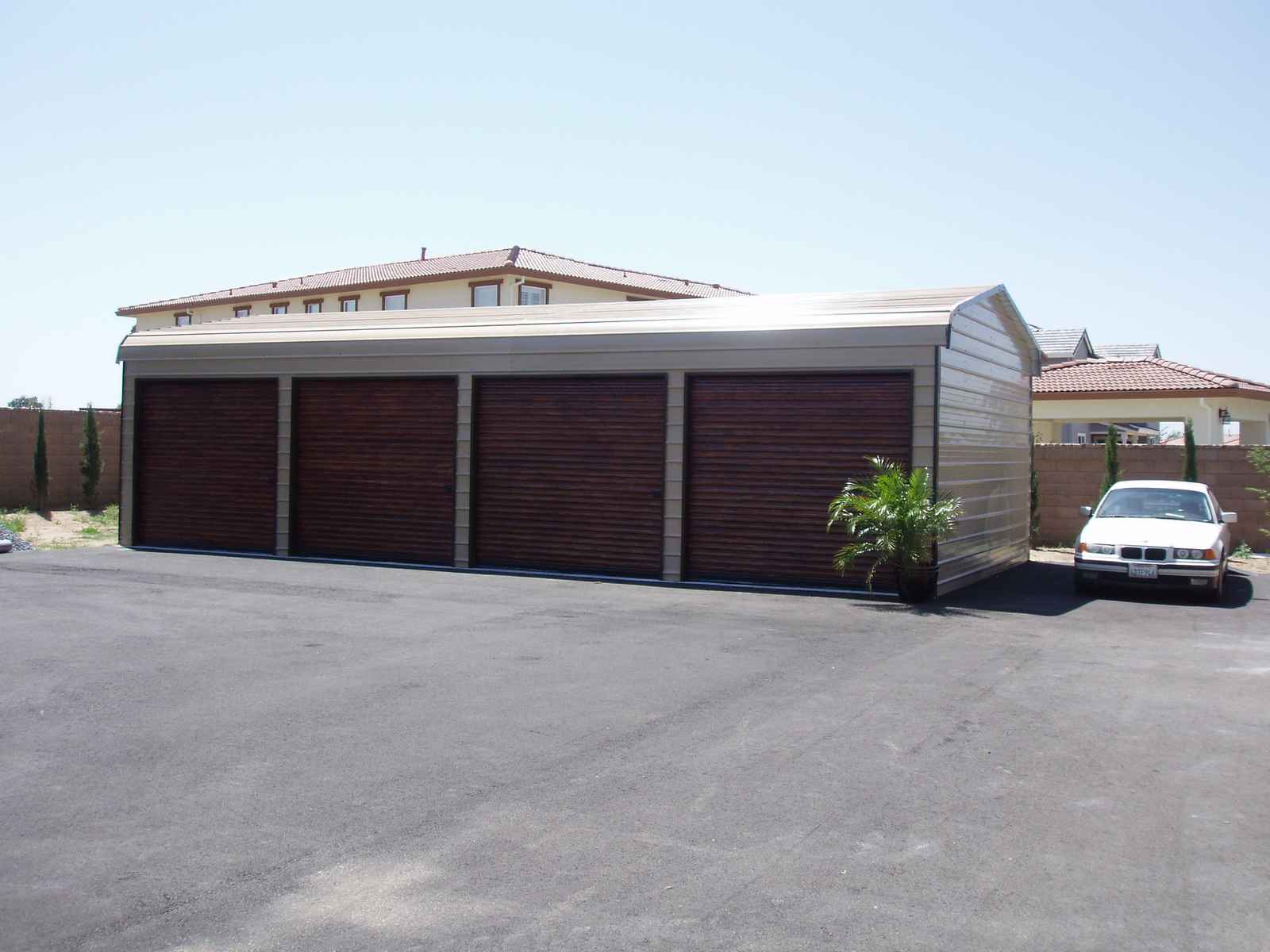 Metal barn with 4 roll-up doors