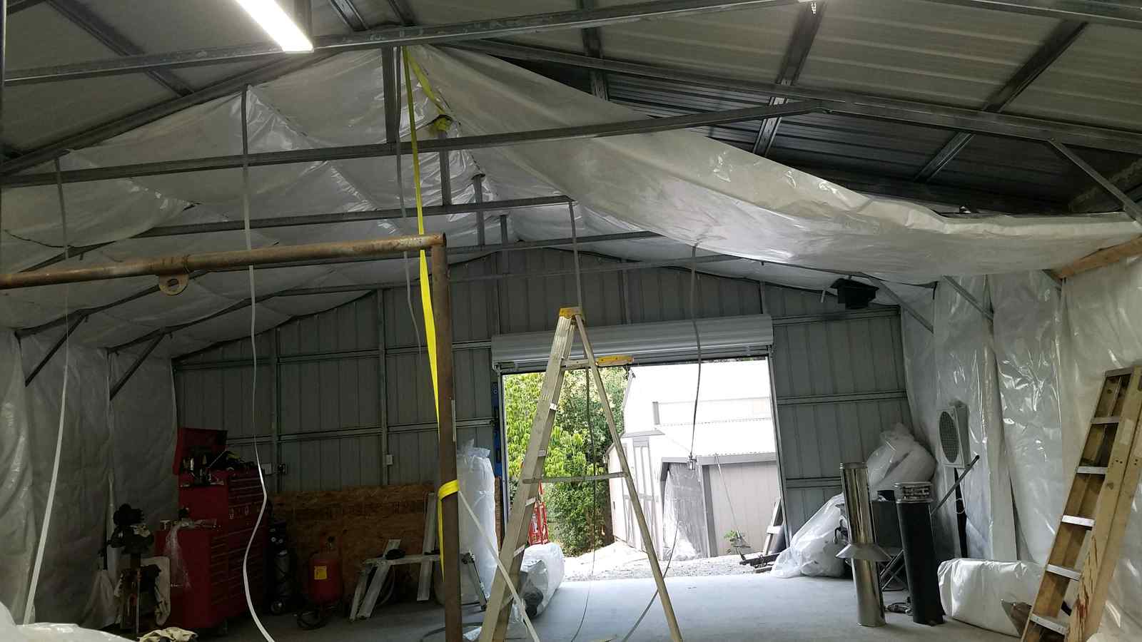 Steel and Stud customer photo — 28×31×9 metal building, Maryland, engineered roof and side panels — interior buildout view