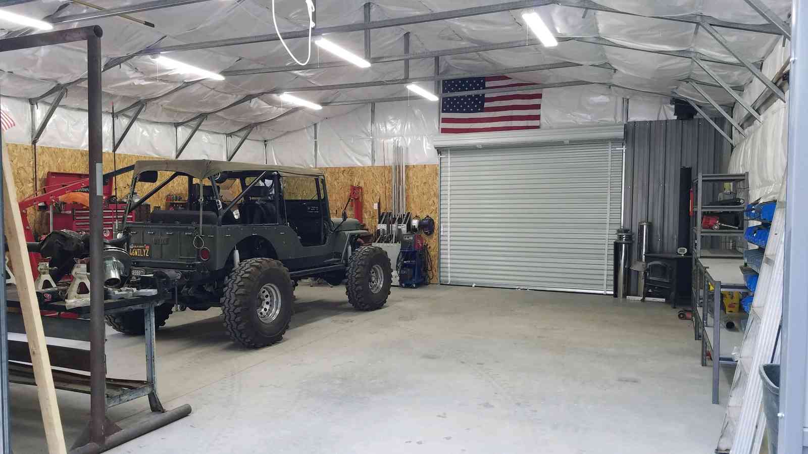 Custom 28×31×9 metal building from Steel and Stud, Maryland, engineered with engineered roof and side panels — interior buildout view