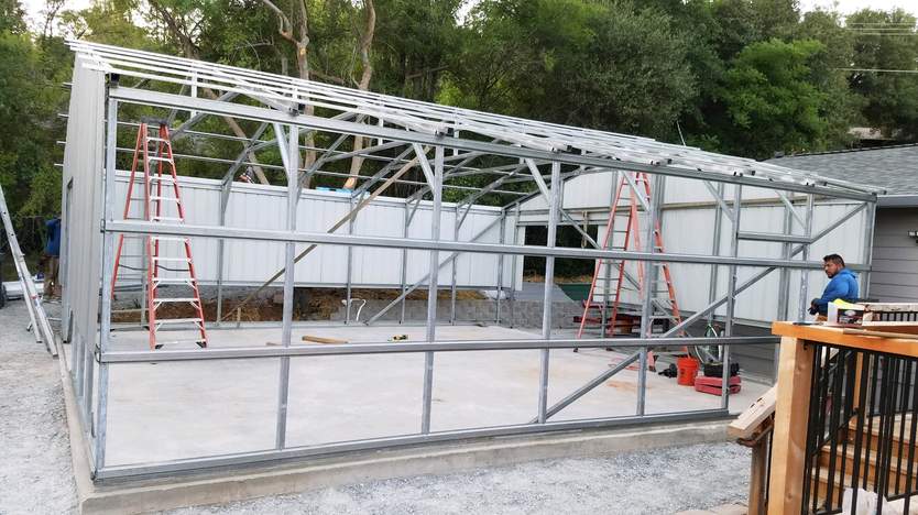 Steel and Stud Metal building install — 28×31×9, Maryland — interior buildout view