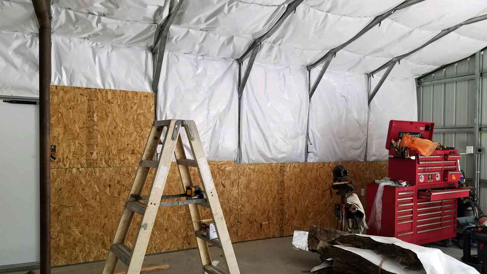 28×31×9 custom metal building, factory-direct from Steel and Stud, Maryland — interior buildout view