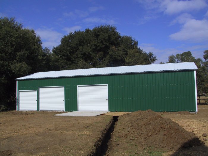 Custom 24×61×11 metal building from Steel and Stud, engineered with A-frame roof with vertical panels