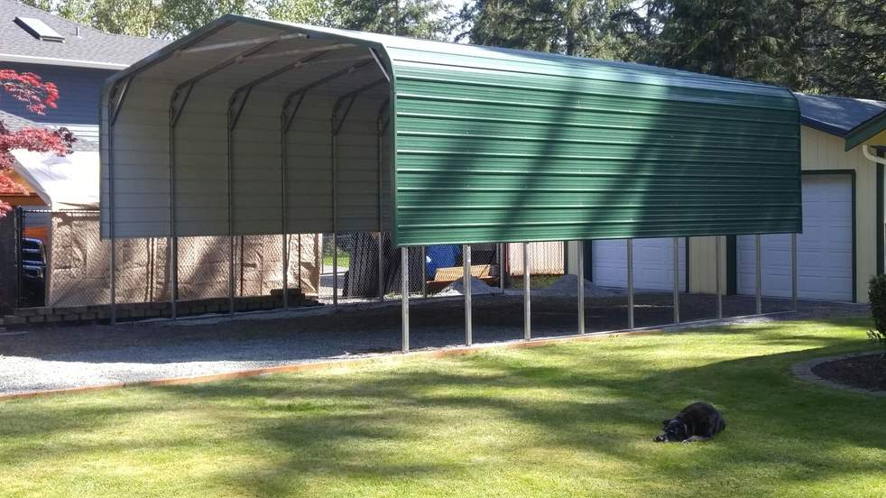 Real Steel and Stud install: 22×31×11 metal building, Washington with engineered roof and side panels