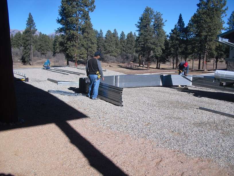 Real Steel and Stud install: metal building with engineered roof and side panels — build sequence photo