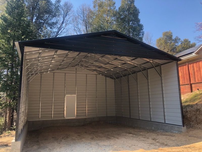 Real Steel and Stud install: metal building with engineered roof and side panels