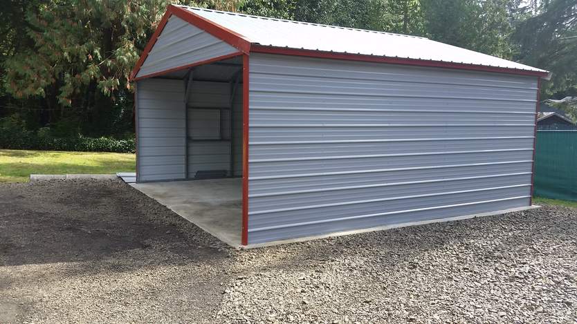 20×20 metal building installed by Steel and Stud — A-frame roof with vertical panels