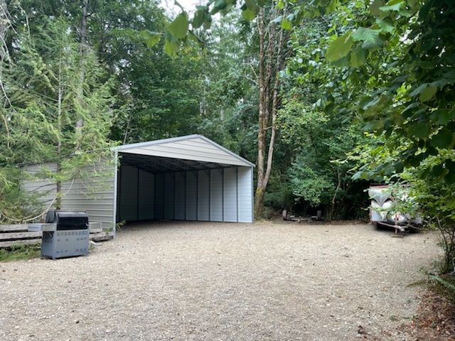 Steel and Stud customer install — metal building, engineered roof and side panels