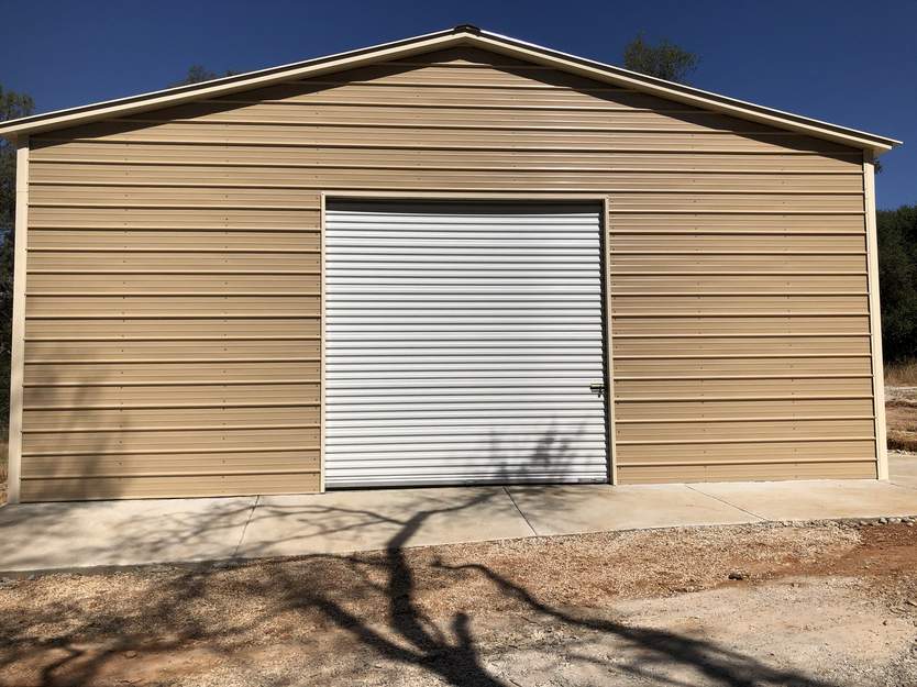 Professionally installed metal building by Steel and Stud — Tong customer install (California)