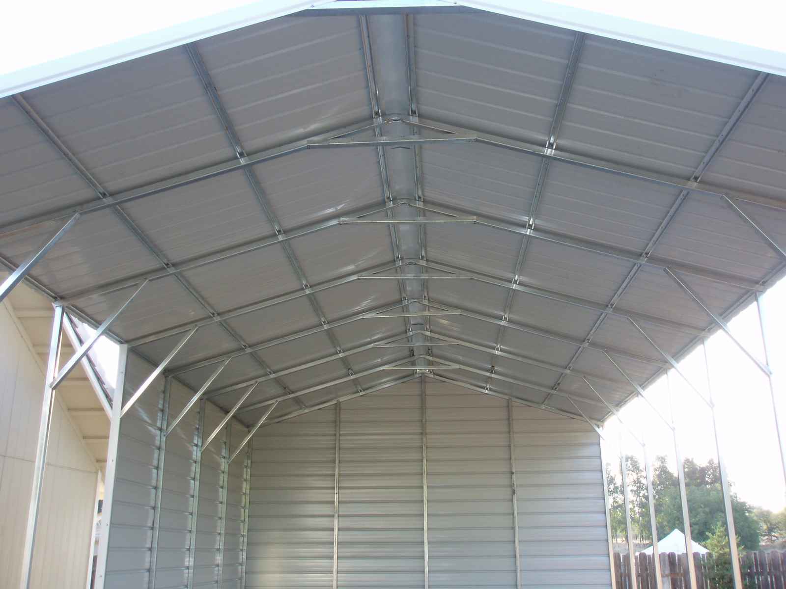 Steel and Stud customer install — metal building, all-vertical roof and side panels